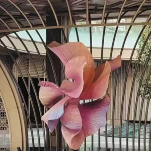Multi-faceted polished surface detail of custom metal landscape sculpture