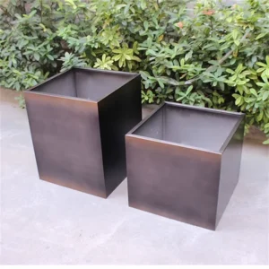 Multiple galvanized steel planters for street landscape