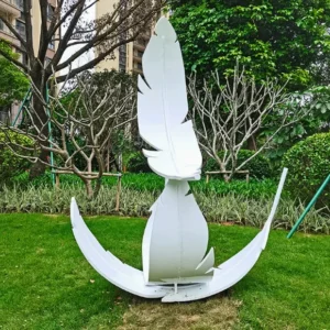 Polished feather surface detail of custom metal landscape sculpture