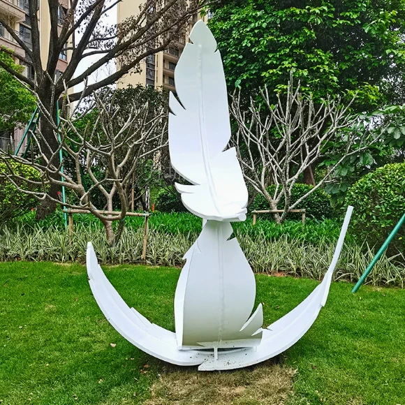 Polished feather surface detail of custom metal landscape sculpture