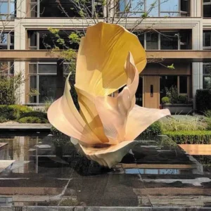 Multi-faceted polished surface detail of custom metal landscape sculpture