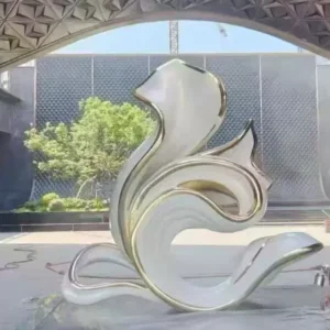Multi-faceted polished surface detail of custom metal landscape sculpture